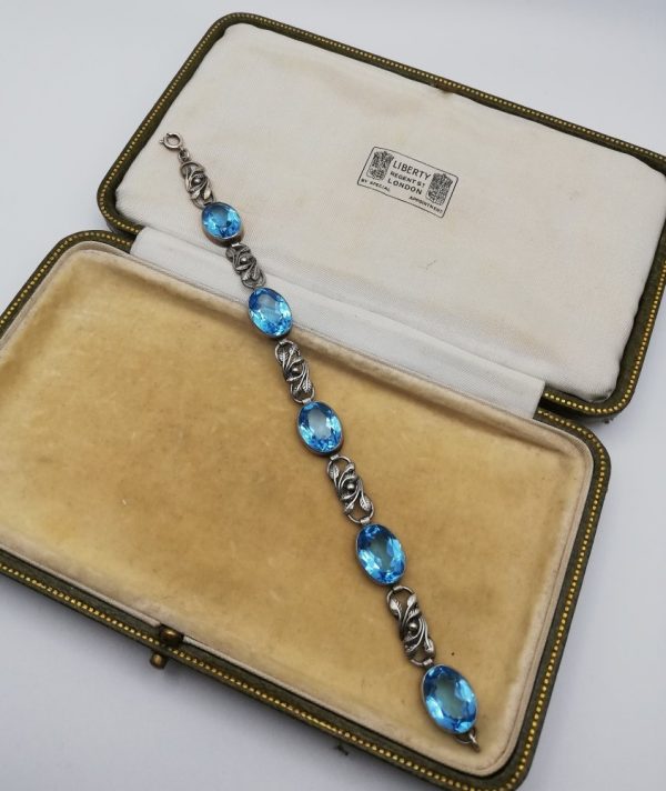 BERNARD INSTONE 1920s Arts & Crafts silver leaves bracelet with large, vibrant, sparkling pastes