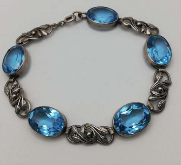 BERNARD INSTONE 1920s Arts & Crafts silver leaves bracelet with large, vibrant, sparkling pastes