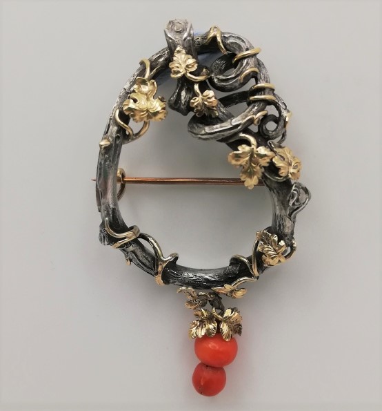 Victorian c1880 rare love knot statement brooch in silver, gold and coral with vine leaves detailing
