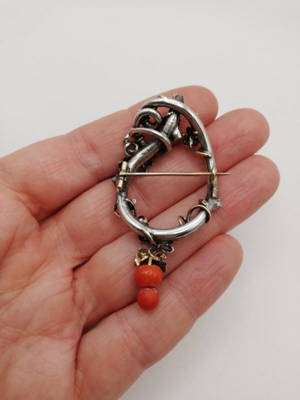 Victorian c1880 rare LOVE KNOT statement brooch in silver, gold and coral with vine leaves detailing