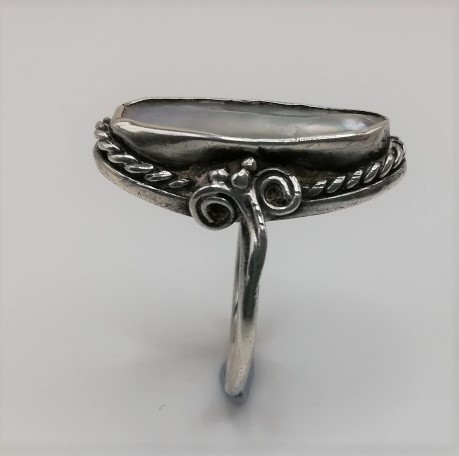 Arts and Crafts ring c1900 in silver with blister pearl, William T Blackband style