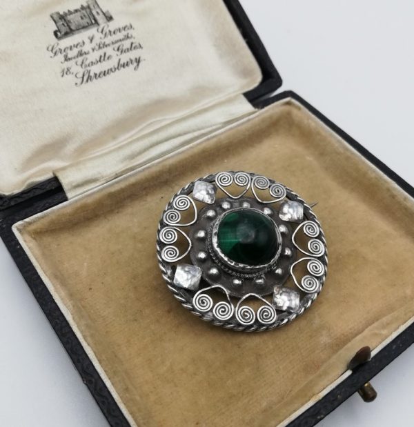 William T Blackband attr Arts and Crafts hammered silver and open work malachite brooch c1910