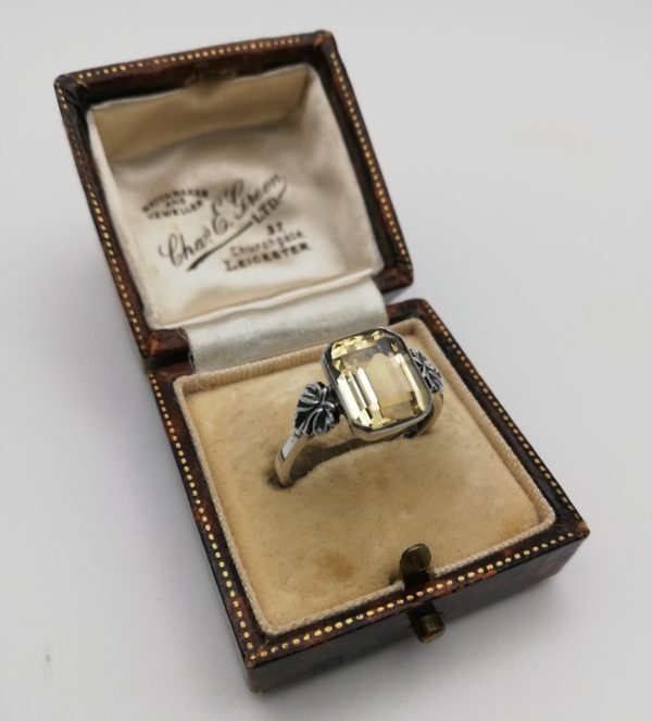 Bernard Instone signed 1930s Deco ring with large emerald cut pale lemon citrine and vine leaves