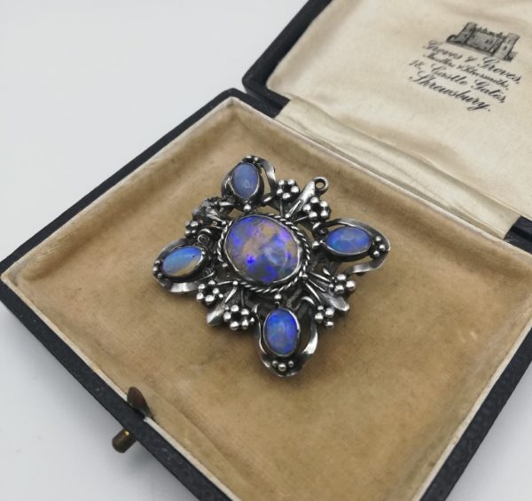 Mary Thew attr early, hand crafted Arts and Crafts brooch / pendant in silver with foiled opals
