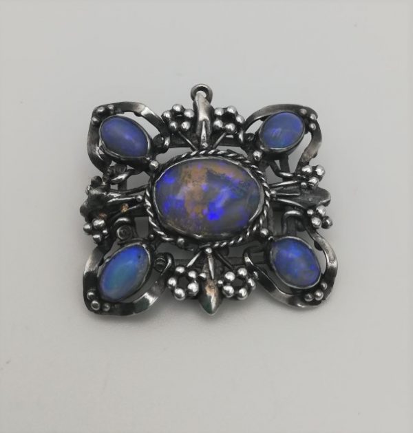 Mary Thew attr early, hand crafted Arts and Crafts brooch / pendant in silver with foiled opals