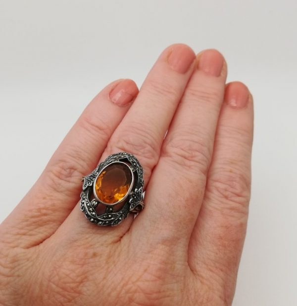 1940s statement cocktail ring by Bernard Instone in silver with marcasites and large paste topaz
