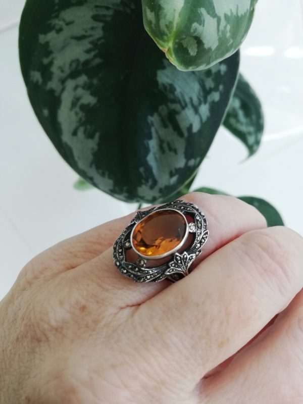 1940s statement cocktail ring by Bernard Instone in silver with marcasites and large paste topaz