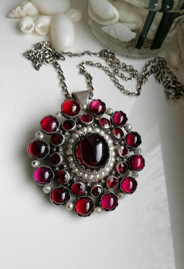 Rare Arts and Crafts jewel, a study of almandine garnets and seed pearls, possibly Sibyl Dunlop 1920s
