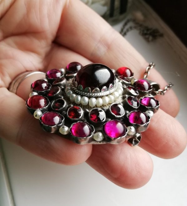 Rare Arts and Crafts jewel, a study of almandine garnets and seed pearls, possibly Sibyl Dunlop 1920s