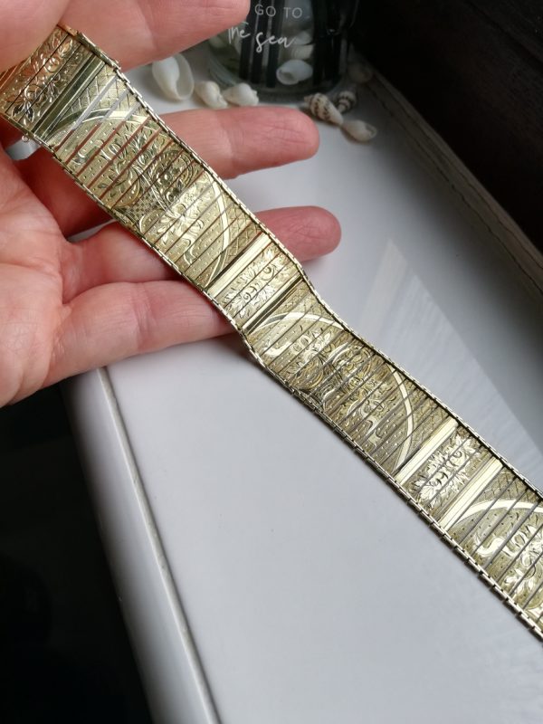 Remarkable 1920s/ 1930s solid 14ct gold articulated wrap bracelet with chased giardinetto design