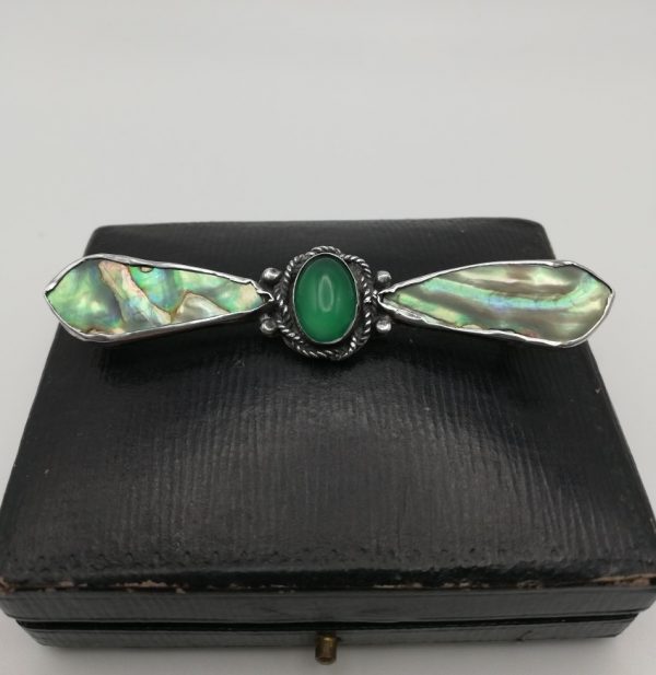 Mary Thew Arts and Crafts winged creature brooch in silver, abalone and chrysoprase