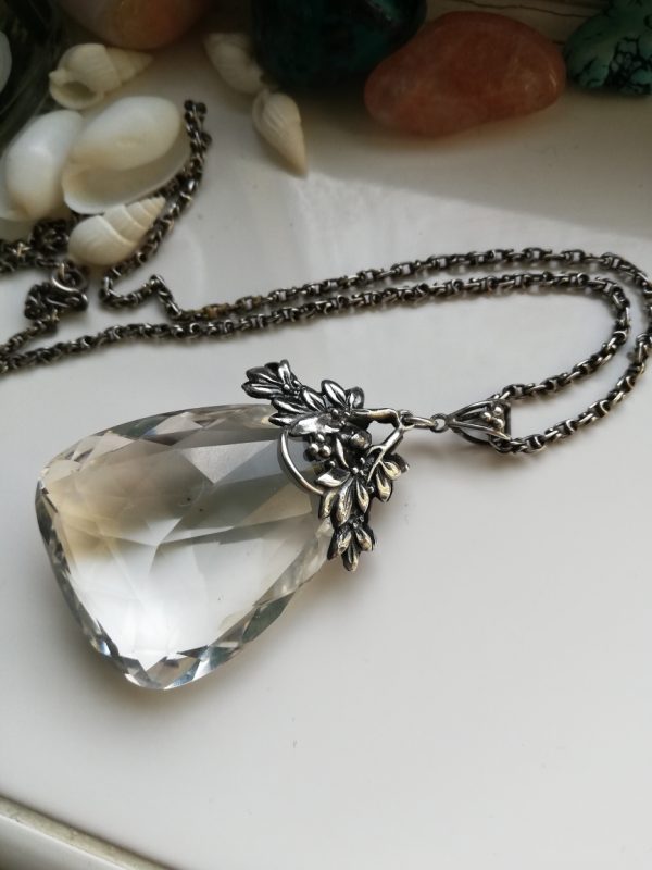 Amy Sandheim 1930s rock crystal drop pendant with triangular form and foliate design
