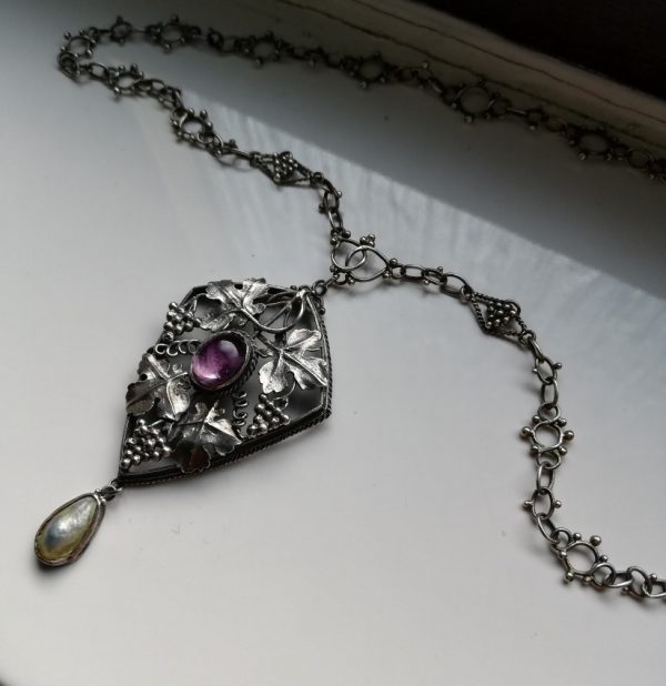 Edward Spencer The Artificers' Guild c1905 hand-wrought vine leaves pendant and chain with amethyst and blister pearl