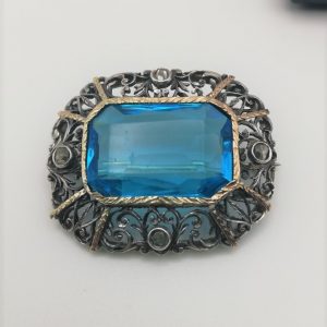 Sibyl Dunlop unique Arts and Crafts brooch in silver and gold with old-cut diamonds and huge Caribbean Blue apatite gem