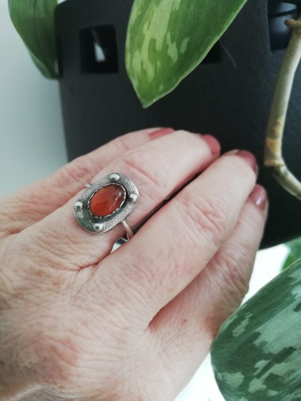 Attractive Arts and Crafts c1920-1930 hammered silver, faux rivets, silver and carnelian ring