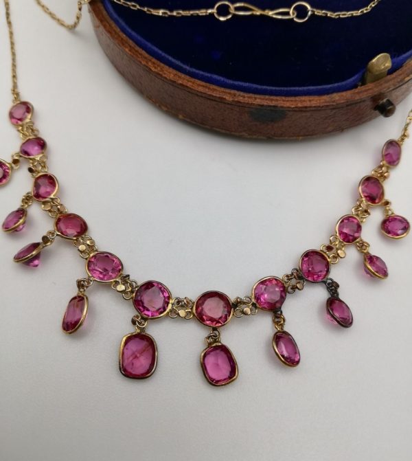Edwardian c1900 9ct gold and 22 pink, glittering pink tourmalines fringe necklace, S type clasp
