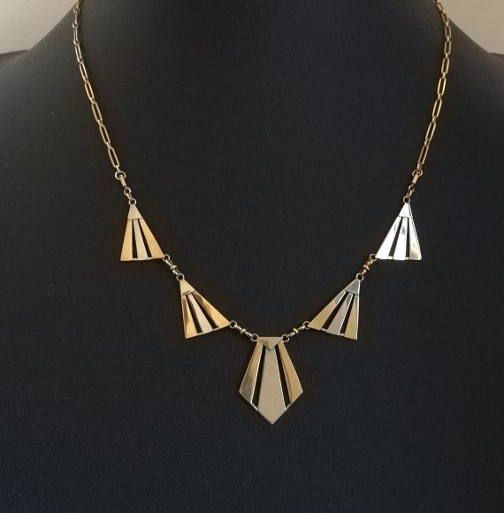 French Art Deco 18ct yellow and white gold Drapery necklace in geometric fan design