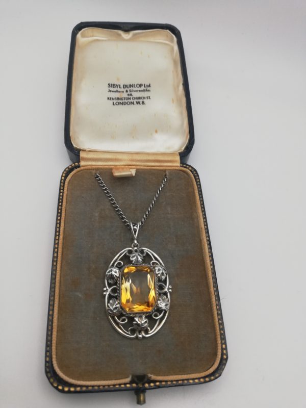 Sibyl Dunlop later Arts and Crafts silver foliate pendant with large citrine in original box