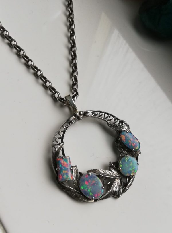 Bernard Instone c1930s Arts and Crafts pendant in silver with super colourful opal doublets