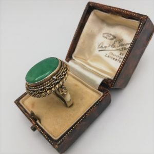 Antique 1920s Chinese export silver gilt and jadeite poison ring with secret carving