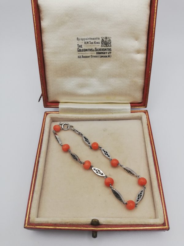 Edwardian c1910 9ct white gold links and coral bracelet, fine and sleek in design