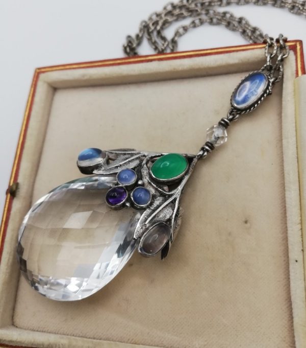 Sumptuous Amy Sandheim 1920s Arts and Crafts foliate rock crystal gem set pendant necklace with moonstone bale