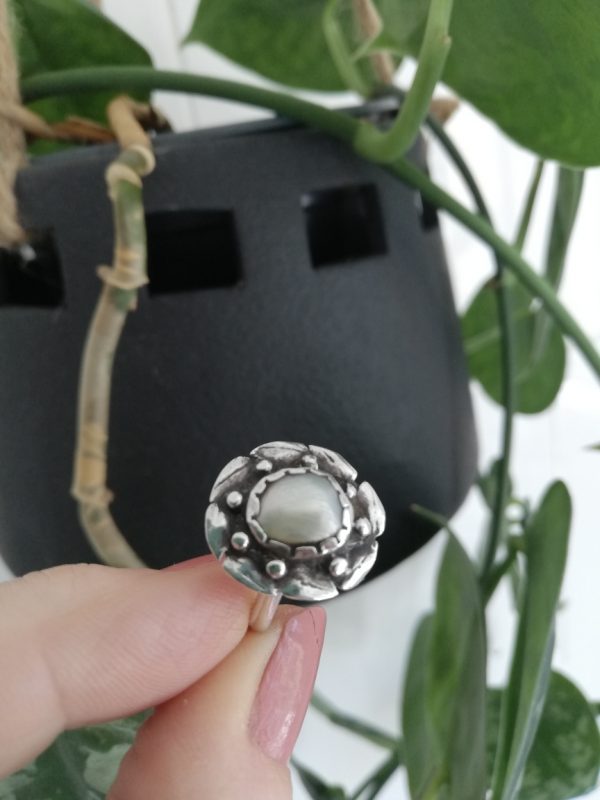 c1900 Arts and Crafts ring in silver , blister pearl and distinctive flower design