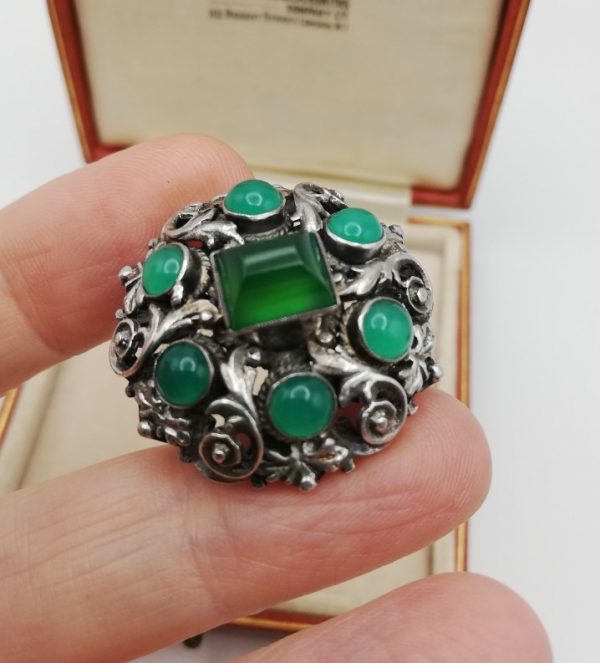 Arts and Crafts c1920 foliate brooch in silver and with vivid apple green chrysoprase stones