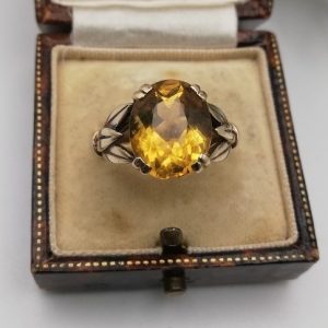 Vintage Arts and Crafts style 9ct gold foliate ring with large citrine stone