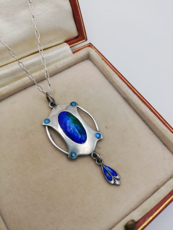 1908 James Fenton Art Nouveau blue enamel drop pendant in silver