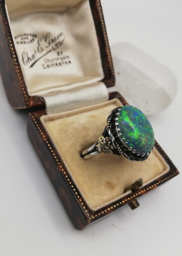 Kate Eadie c1905 gloriously fiery Boulder opal Arts and Crafts ring in silver and gold -stunning Birmingham School ring