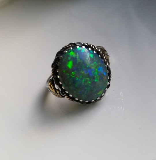 Kate Eadie c1905 gloriously fiery Boulder opal Arts and Crafts ring in silver and gold -stunning Birmingham School ring