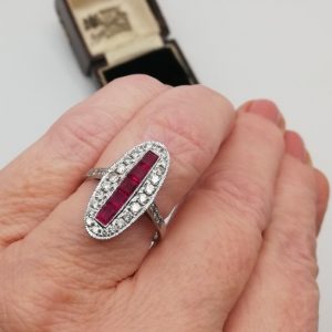 Art Deco gorgeous navette shaped ring with 5 rubies and 24 diamonds in 18ct white gold