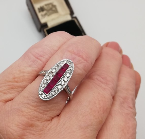 Art Deco gorgeous navette shaped ring with 5 rubies and 24 diamonds in 18ct white gold