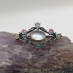 Jessie King for Liberty & Co c1900 silver enamel and moonstone brooch