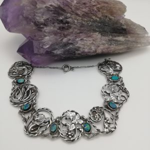 Unique c1900 hand crafted English Arts and Crafts bracelet in silver with lively opal doublets