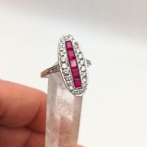 Art Deco gorgeous navette shaped ring with 5 rubies and 24 diamonds in 18ct white gold
