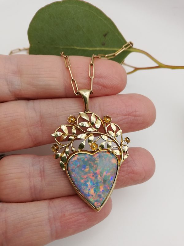 c1905 Artificers' Guild attr Arts and Crafts18ct gold heart-shaped opal pendant on gold chain