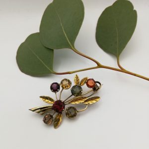 c1930s hand-crafted Arts and Crafts silver gilt flower spray brooch with mixed gemstones