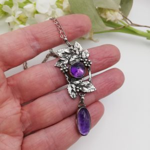 c1900 Beautiful Arts and Crafts hand crafted silver foliate pendant with foiled amethysts