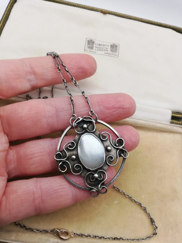 c1900 Arts and Crafts hand crafted silver and blister pearl pendant with double chains