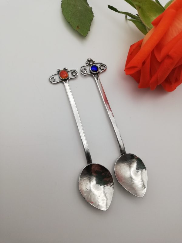 Pair of hand-wrought antique Arts and crafts coffee spoons in sterling silver with enamel