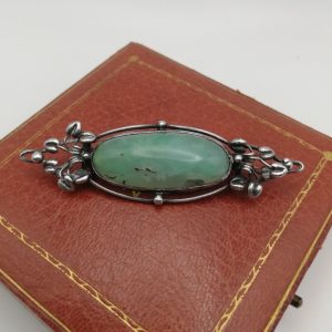 c1900 hand-wrought English Arts and Crafts brooch in silver and jade with tiny leaves