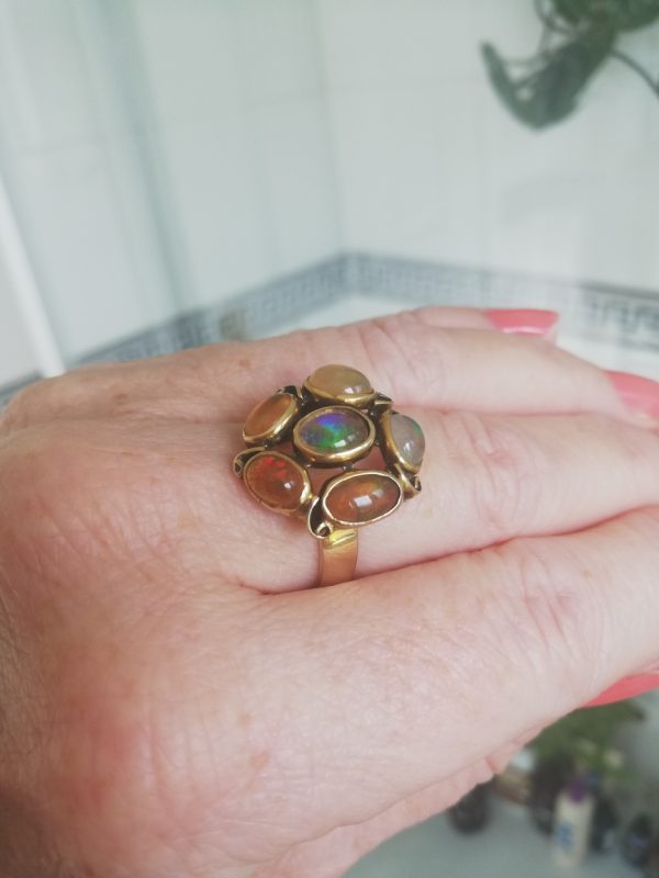 Substantial hand-crafted 14ct gold and jelly opals Arts and Crafts cluster ring, possibly studio commission