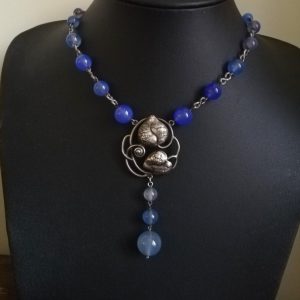 Antique Arts and Crafts silver and blue chalcedony necklace with hand crafted foliate panel