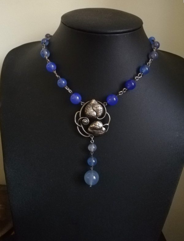 Antique Arts and Crafts silver and blue chalcedony necklace with hand crafted foliate panel
