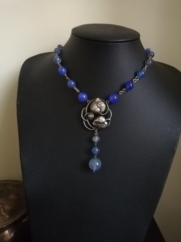 Antique Arts and Crafts silver and blue chalcedony necklace with hand crafted foliate panel