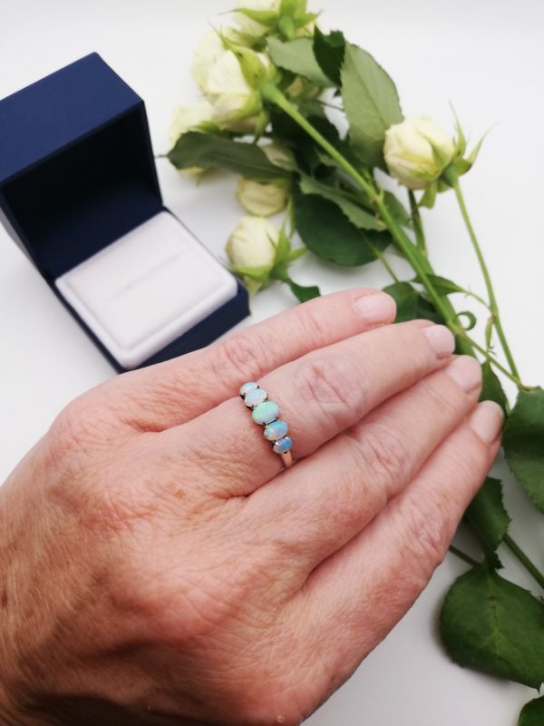 Antique English sweet 9ct gold and 5 opal ring with lively stones