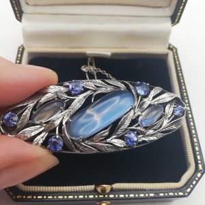 Museum piece Bernard Instone sapphires and blue Ceylon moonstones brooch in pristine condition c1930
