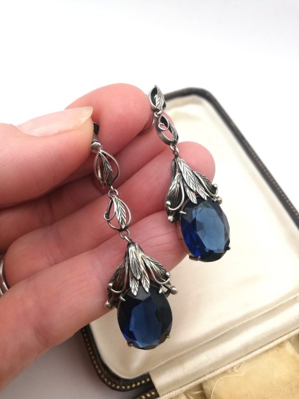 Sumptuous chandelier type earrings by Bernard Instone with sapphire pastes, late 1920s